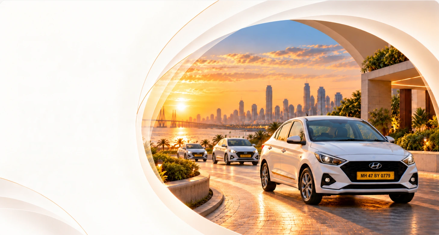A white sedan on a waterfront road at sunset, with two more white sedans behind it